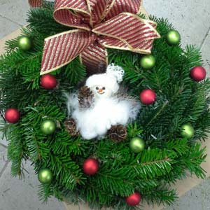 Das Blümchen - Blumen und Mehr: Blumen, Topfpflanzen, Geschenkartikel, Duftkerzen, Raumdüfte, dekorierte Blumenstöcke: Floristik zu Weihnachten dekorativer Kranz mit Schneemännchen